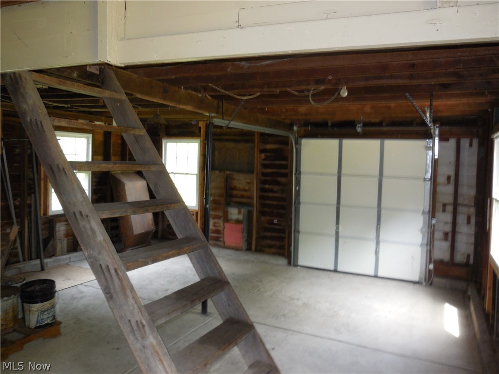 7101 Som Center Road Solon, OH 44139 - Photo 22 of 23 Inside barn steps lead to Loft. Door in rear lifts up.