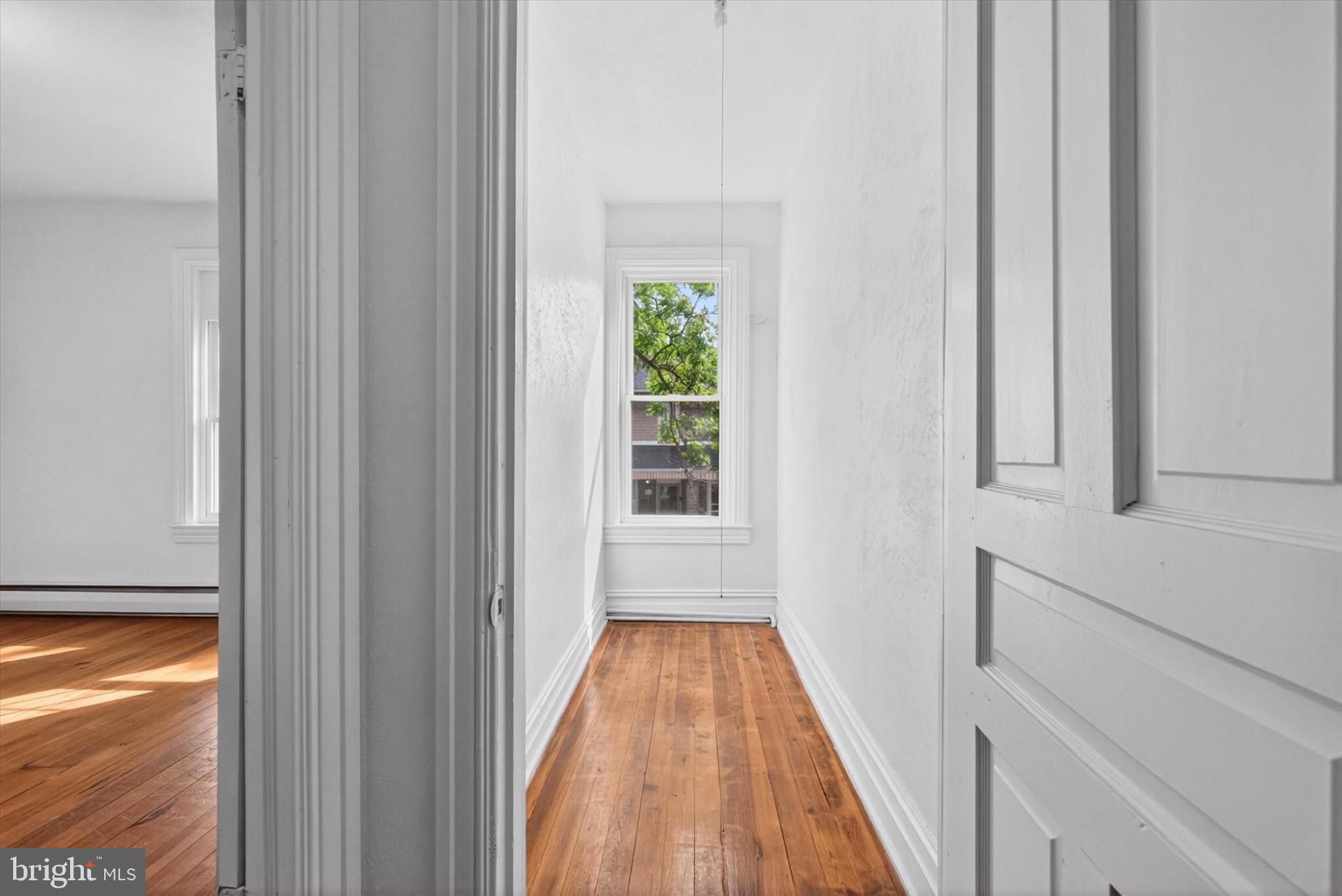 723 Manchester Street York, PA 17404 - Photo 21 of 32 Bright hallway with natural light.