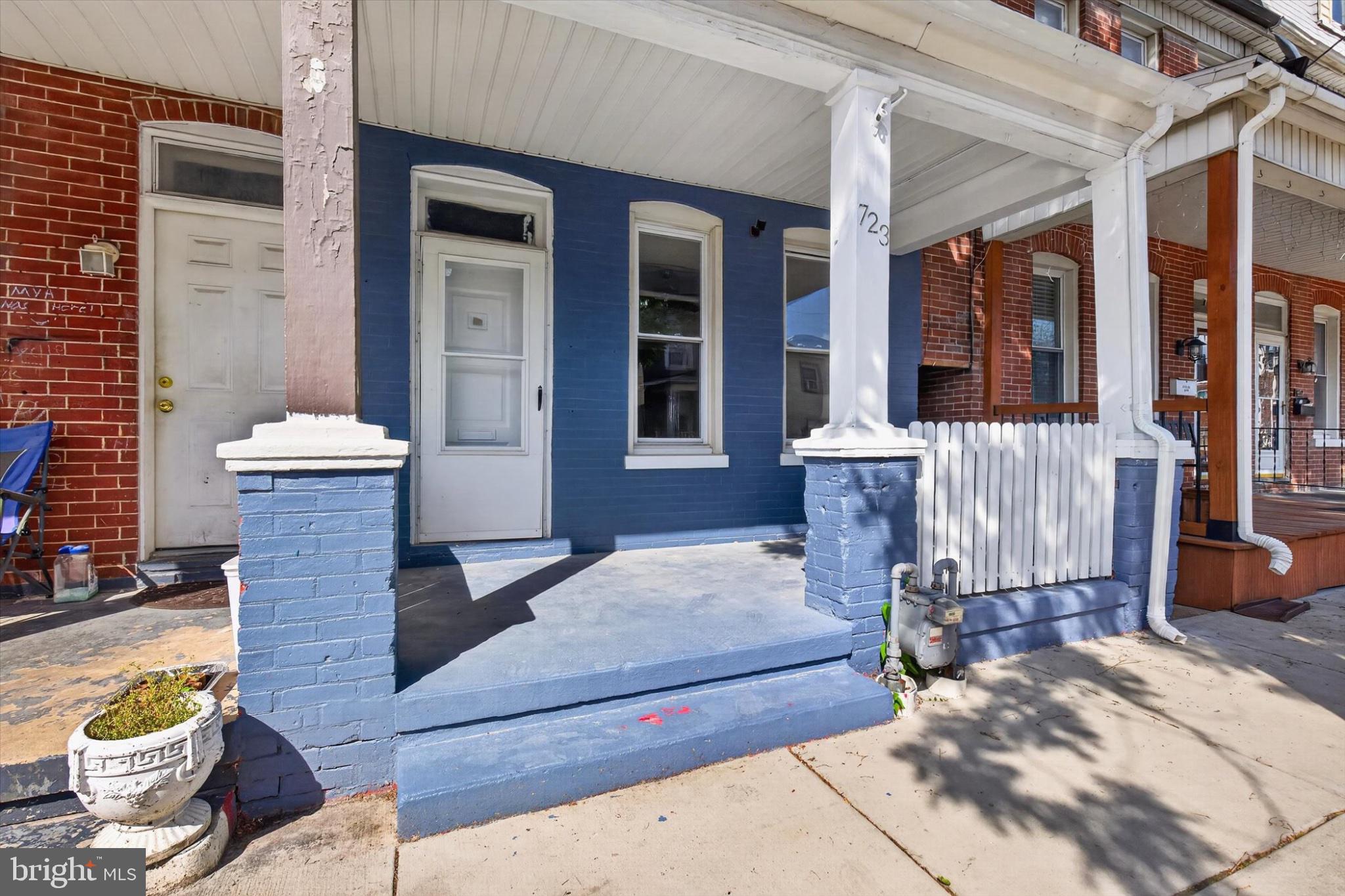 723 Manchester Street York, PA 17404 - Photo 25 of 32 Charming porch with vibrant hues.