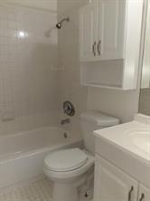 4100 Riverside Drive, Unit 1 Coral Springs, FL 33065 - Photo 14 of 22 a bathroom with a toilet and a bathtub