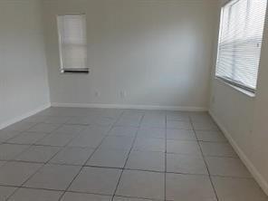 4100 Riverside Drive, Unit 1 Coral Springs, FL 33065 - Photo 17 of 22 an empty room with a window