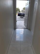 4100 Riverside Drive, Unit 1 Coral Springs, FL 33065 - Photo 18 of 22 a view of a car garage door