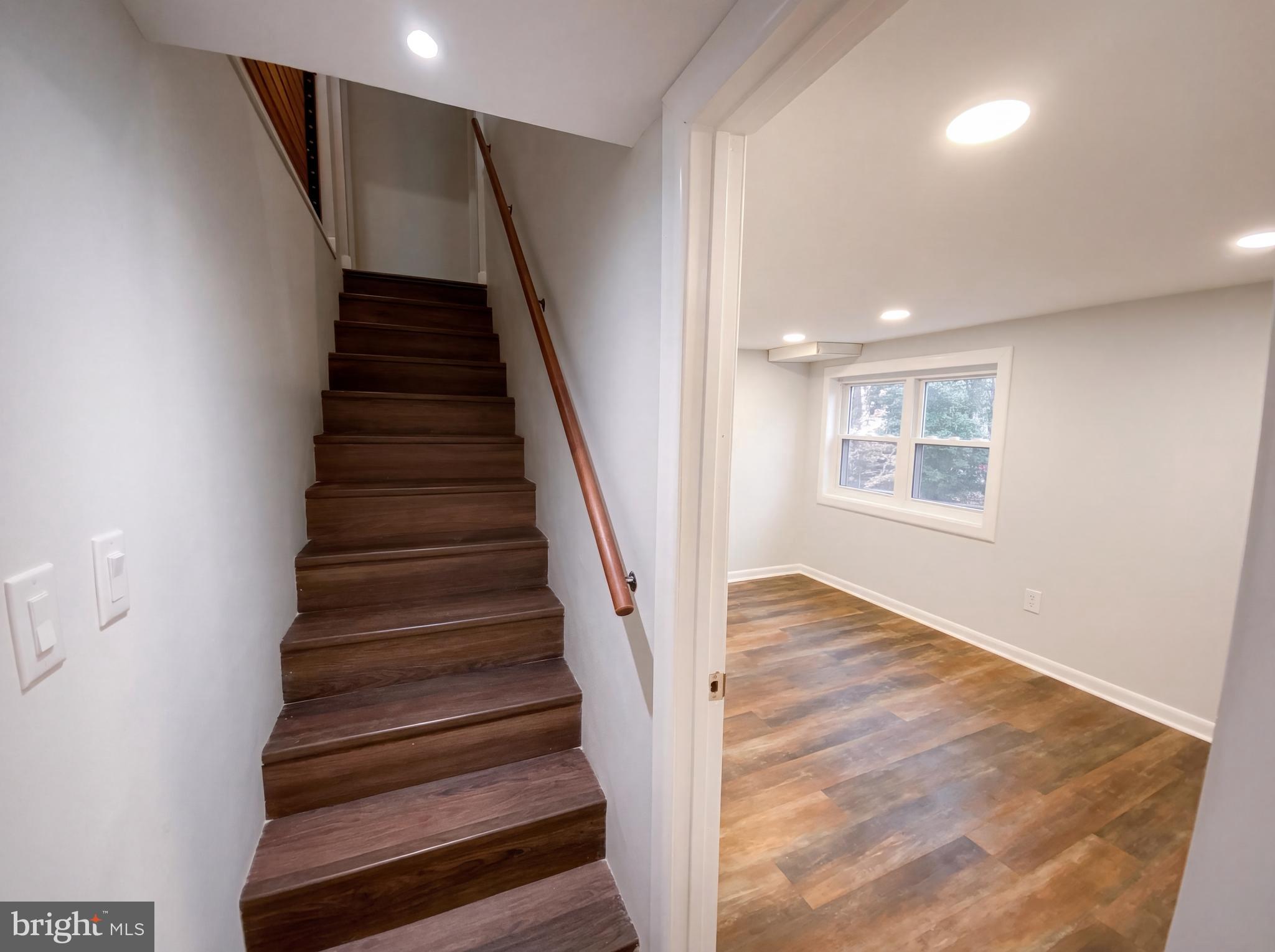 18320 Candice Drive Triangle, VA 22172 - Photo 12 of 19 a view of an entryway with wooden floor