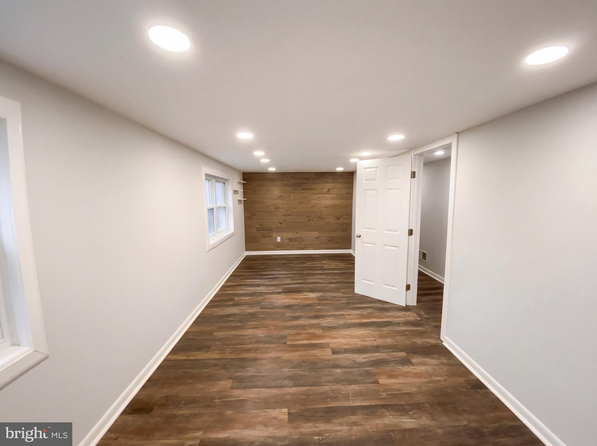 18320 Candice Drive Triangle, VA 22172 - Photo 14 of 19 a view of hallway with wooden floor