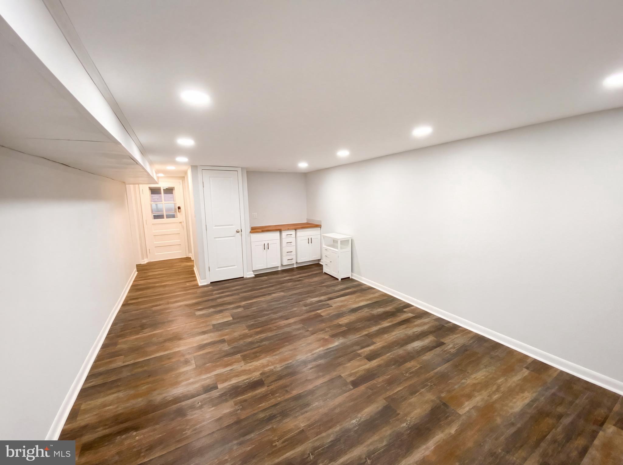 18320 Candice Drive Triangle, VA 22172 - Photo 15 of 19 a view of empty room with wooden floor