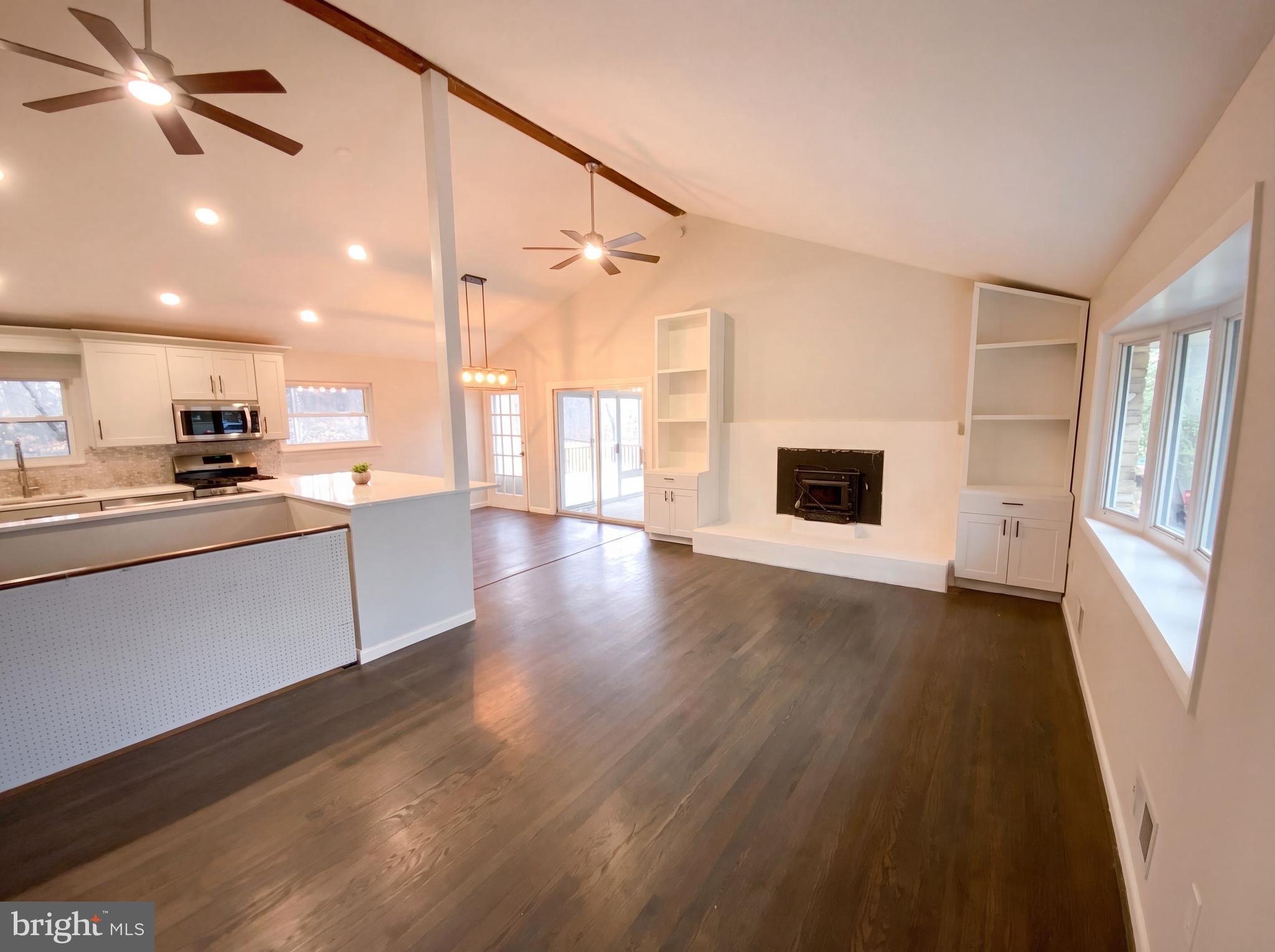 18320 Candice Drive Triangle, VA 22172 - Photo 3 of 19 a kitchen with a refrigerator and a stove top oven