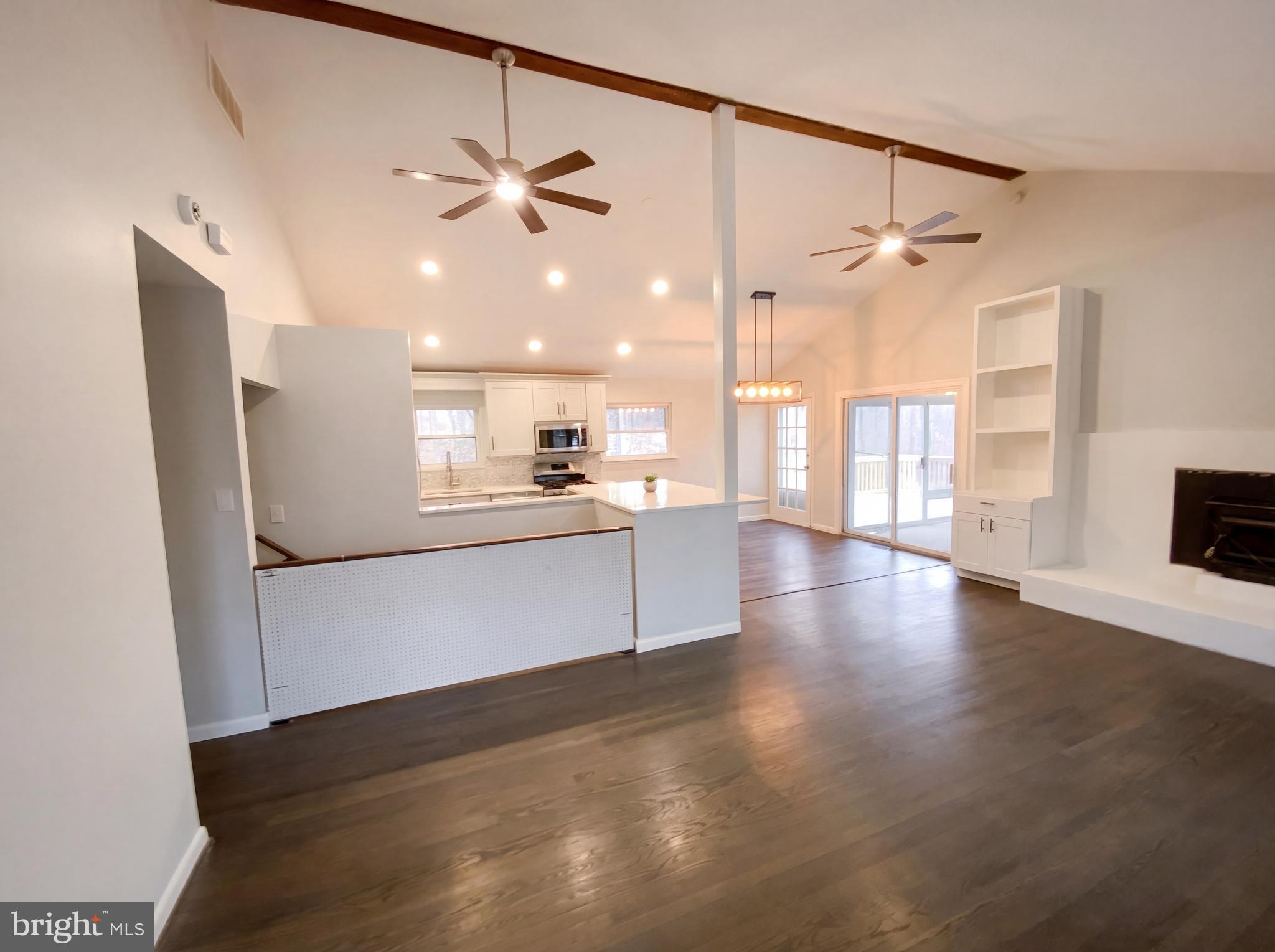 18320 Candice Drive Triangle, VA 22172 - Photo 7 of 19 a view of a kitchen with a sink and a refrigerator