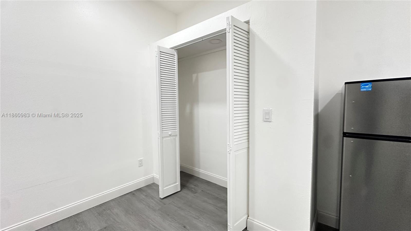 12983 Southwest 229th Lane Miami, FL 33170 - Photo 3 of 9 a view of a kitchen with a refrigerator