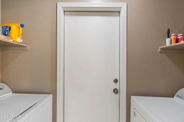 a bathroom with a toilet and sink