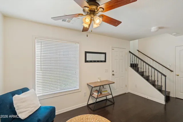a workspace with furniture and a window