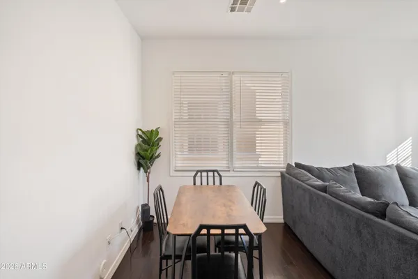 a view of a livingroom with furniture and window