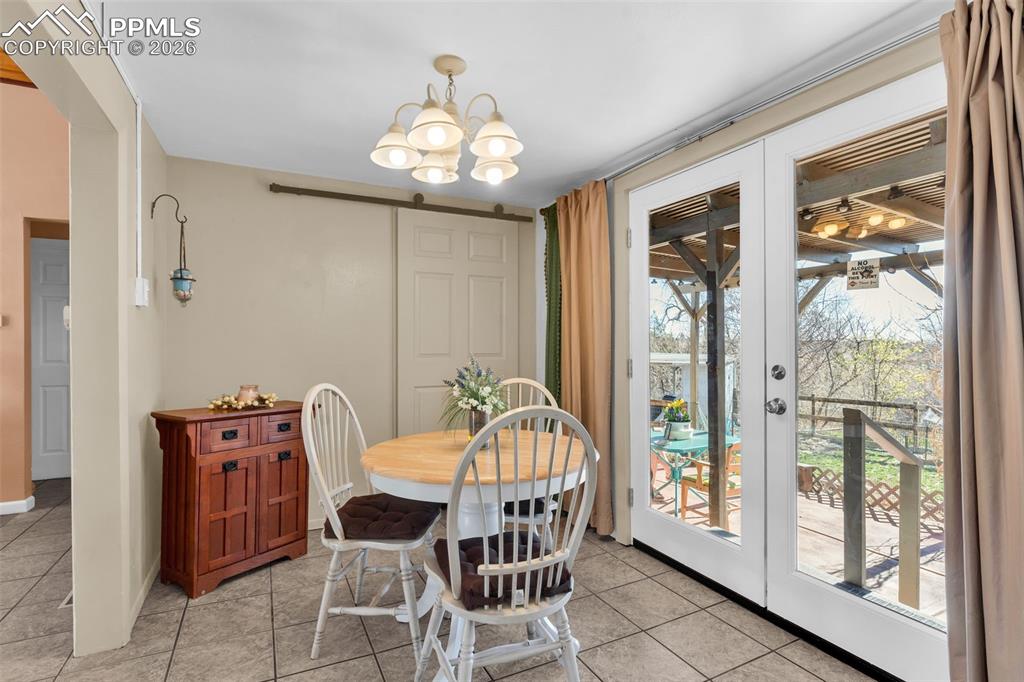 5796 County Rd CC108 Colorado City, CO 81019 - Photo 17 of 48 a view of a dining room with furniture window and outside view