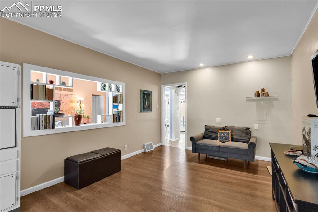 5796 County Rd CC108 Colorado City, CO 81019 - Photo 24 of 48 a living room with furniture window and wooden floor