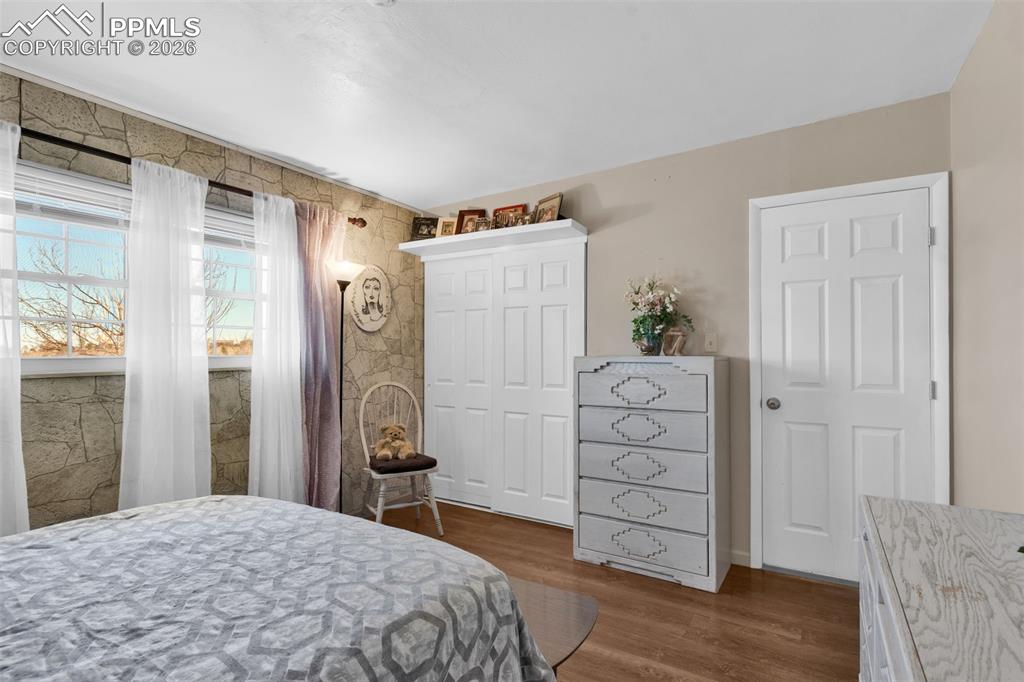 5796 County Rd CC108 Colorado City, CO 81019 - Photo 28 of 48 a bedroom with a bed and a dresser