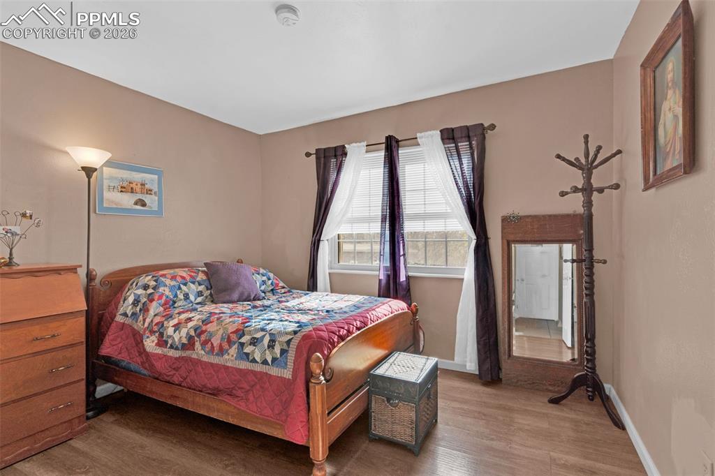 5796 County Rd CC108 Colorado City, CO 81019 - Photo 29 of 48 a bedroom with a bed and a window