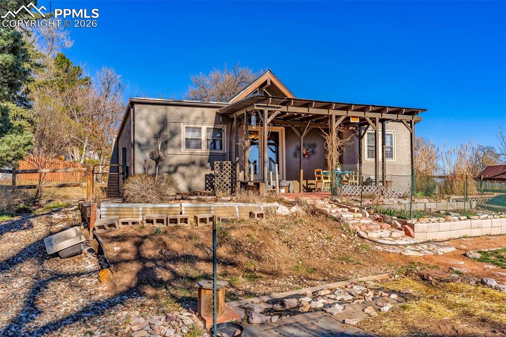 5796 County Rd CC108 Colorado City, CO 81019 - Photo 34 of 48 a front view of a house with street