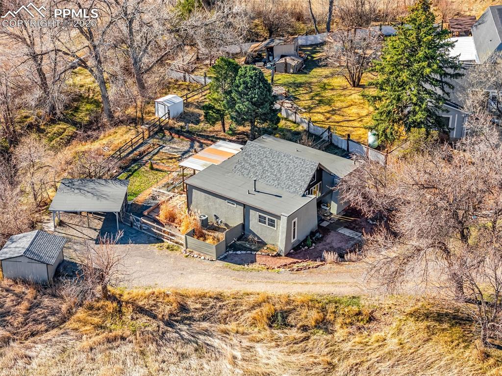 5796 County Rd CC108 Colorado City, CO 81019 - Photo 42 of 48 a view of roof with wooden fence