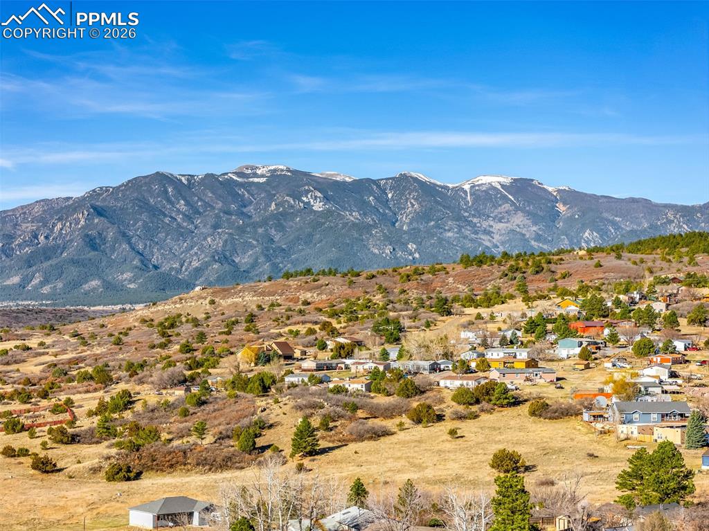 5796 County Rd CC108 Colorado City, CO 81019 - Photo 47 of 48 a view of a large building with mountains in the background