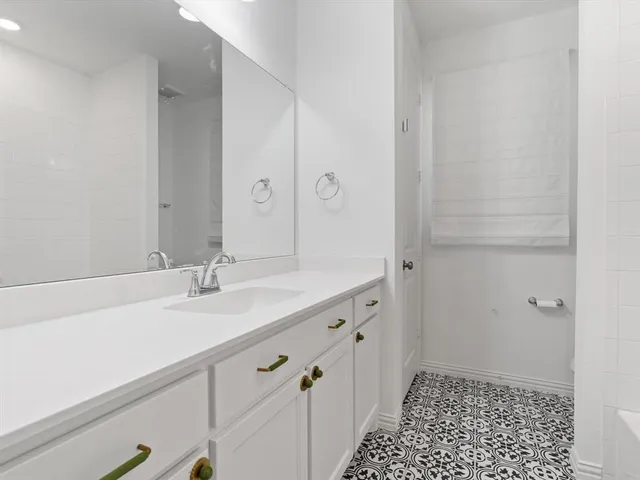 an empty room with view of bathroom