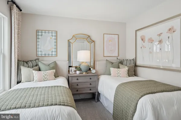 a dining room with a table and chairs