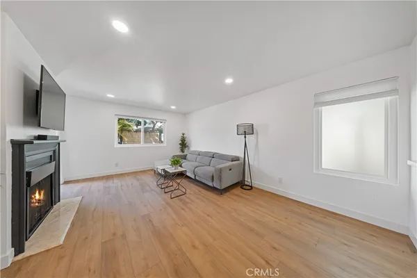 a living room with a couch and a flat screen tv