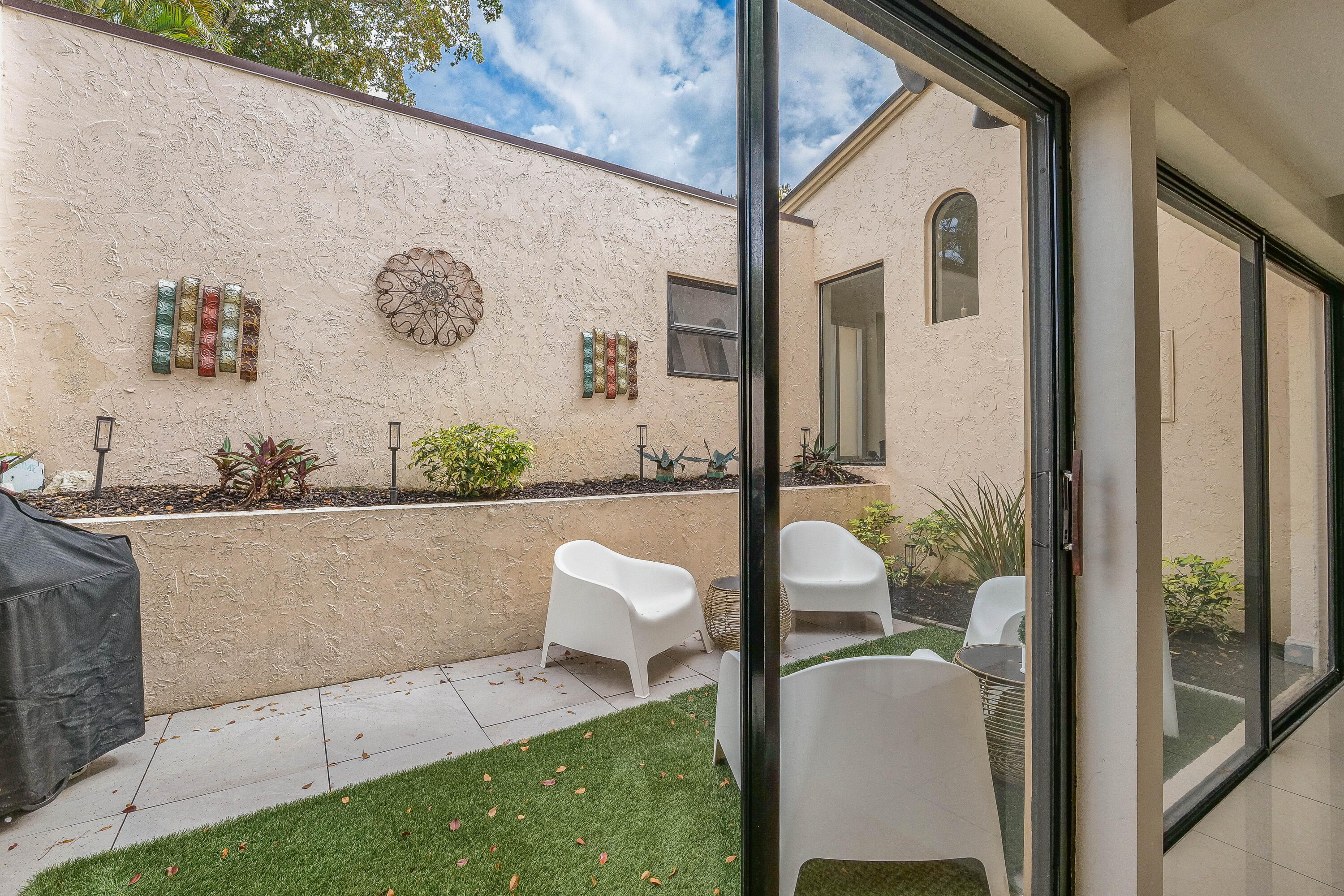 5523 Constant Spring Terrace, Unit 222 Lauderhill, FL 33319 - Photo 15 of 60 a bath tub sitting next to a bathroom sink