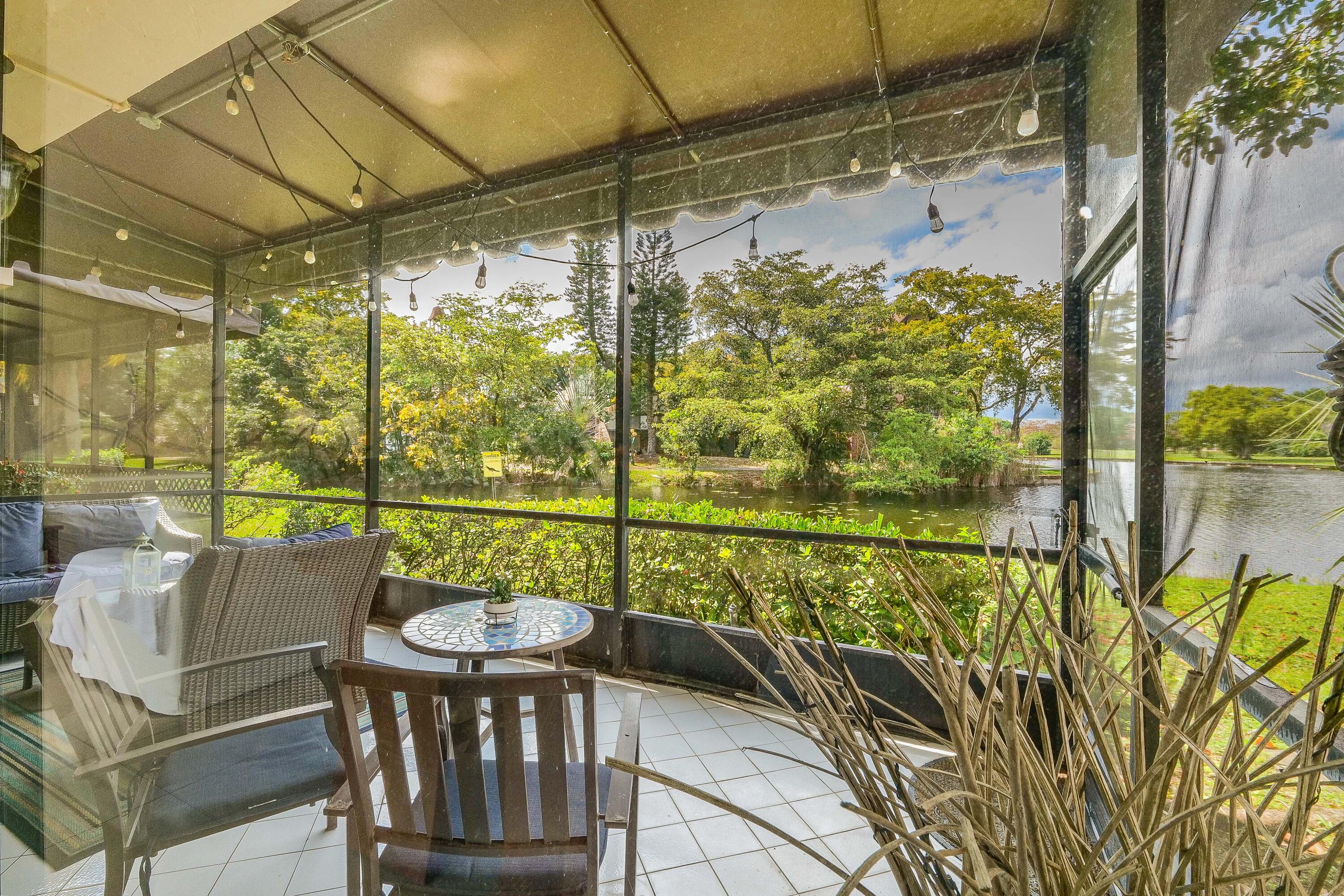 5523 Constant Spring Terrace, Unit 222 Lauderhill, FL 33319 - Photo 2 of 60 a balcony view with a seating space