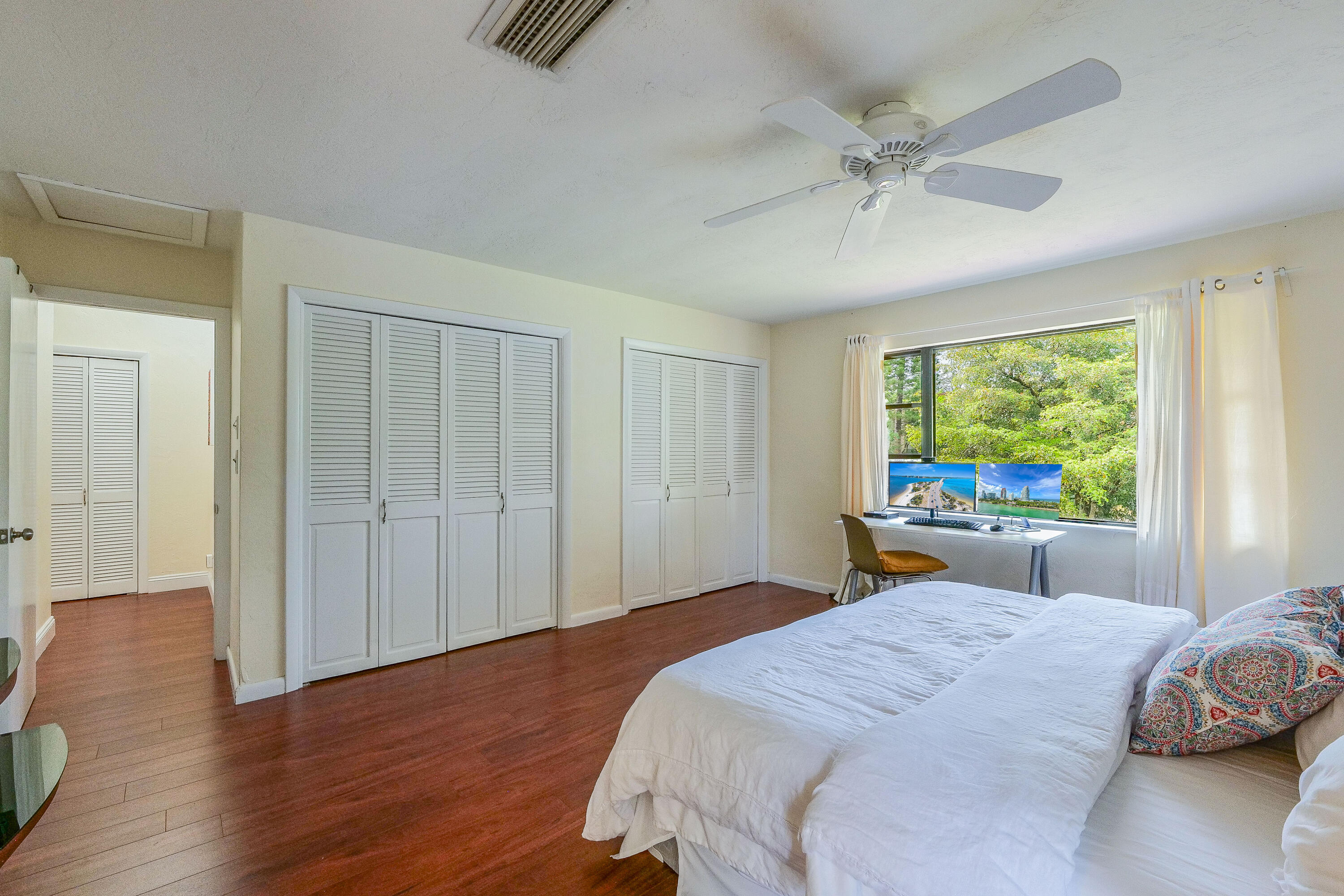 5523 Constant Spring Terrace, Unit 222 Lauderhill, FL 33319 - Photo 26 of 60 a bedroom with a bed and a window