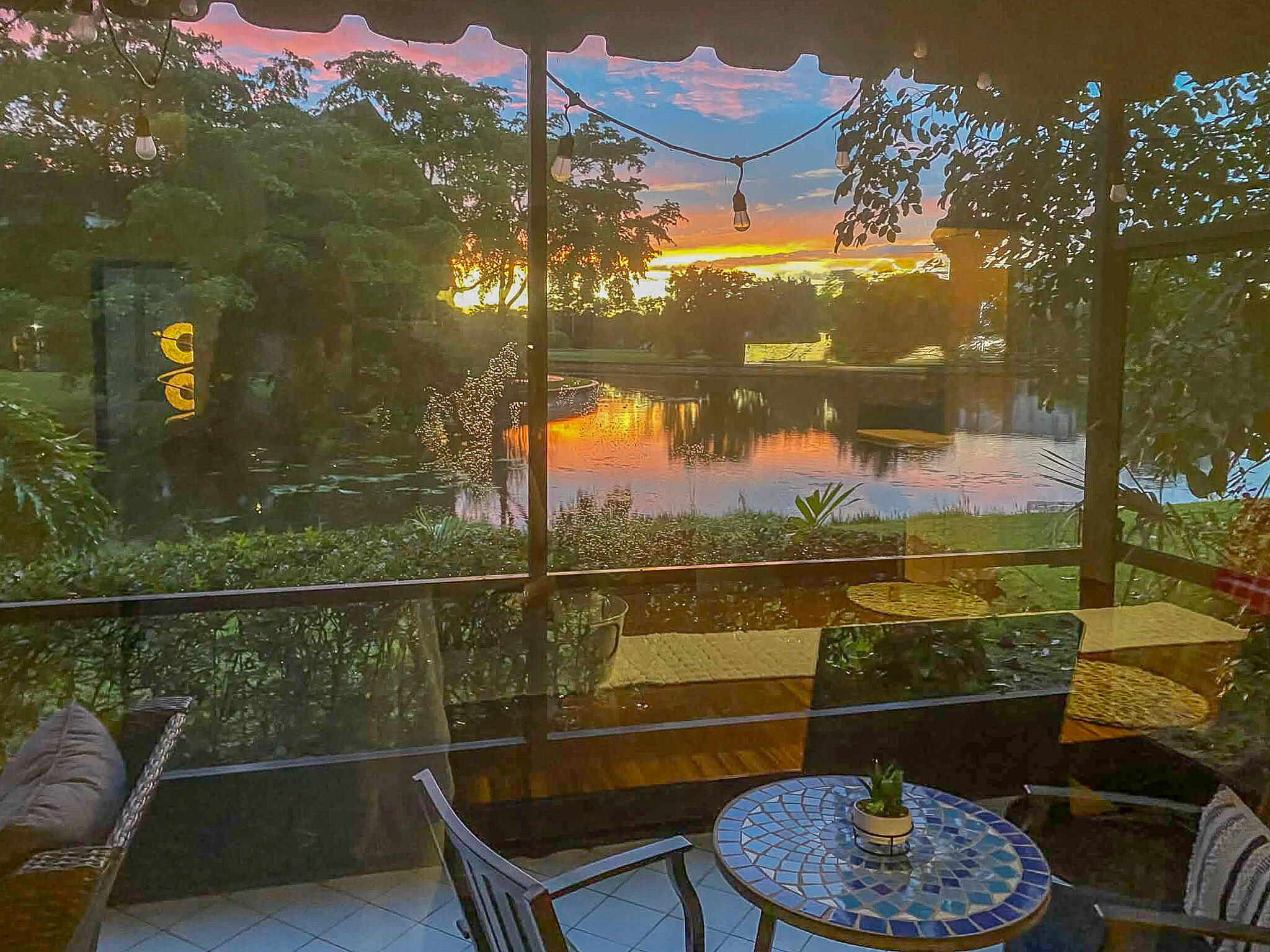 5523 Constant Spring Terrace, Unit 222 Lauderhill, FL 33319 - Photo 3 of 60 a view of a lake from a balcony with furniture