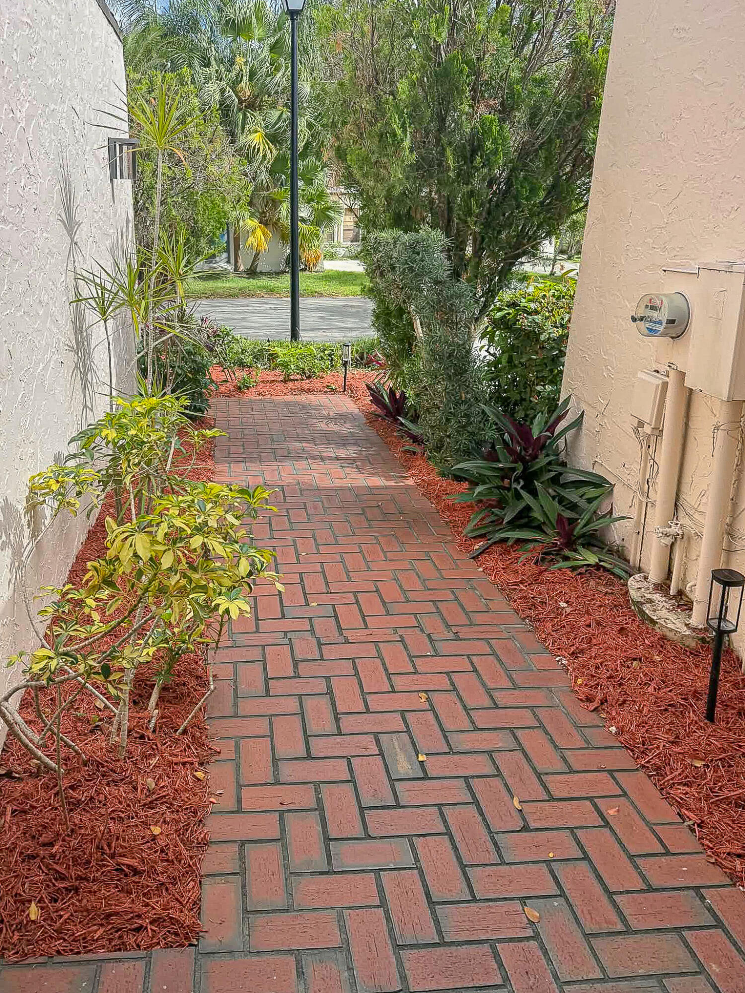 5523 Constant Spring Terrace, Unit 222 Lauderhill, FL 33319 - Photo 34 of 60 a view of a pathway with a yard