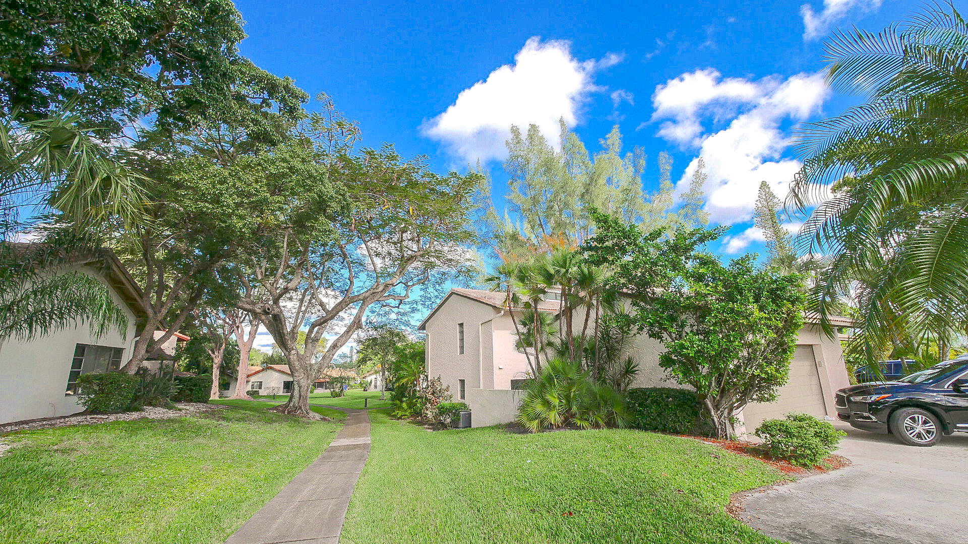 5523 Constant Spring Terrace, Unit 222 Lauderhill, FL 33319 - Photo 47 of 60 a front view of a house with a yard