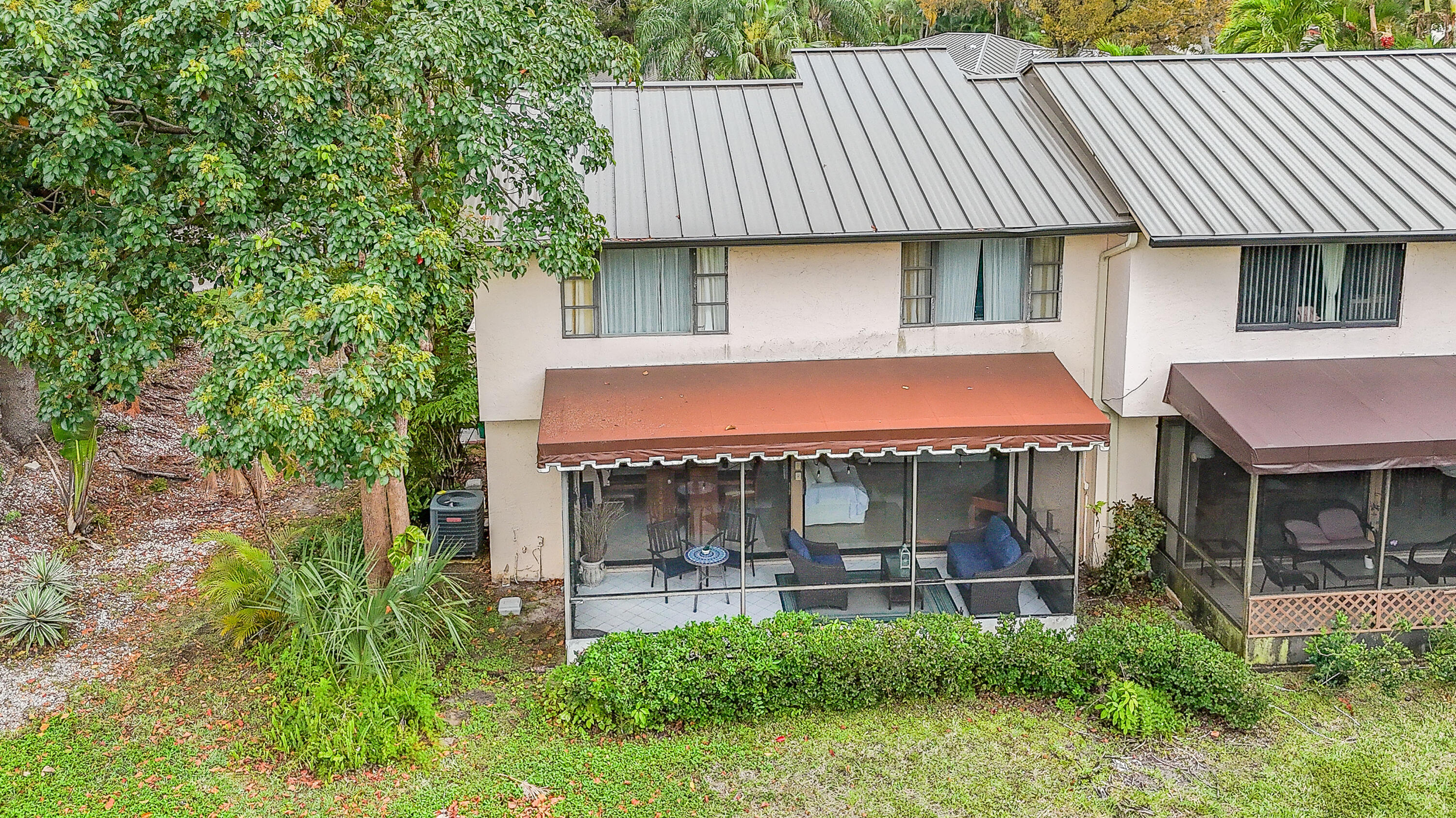 5523 Constant Spring Terrace, Unit 222 Lauderhill, FL 33319 - Photo 59 of 60 a house view with a sitting space garden and patio