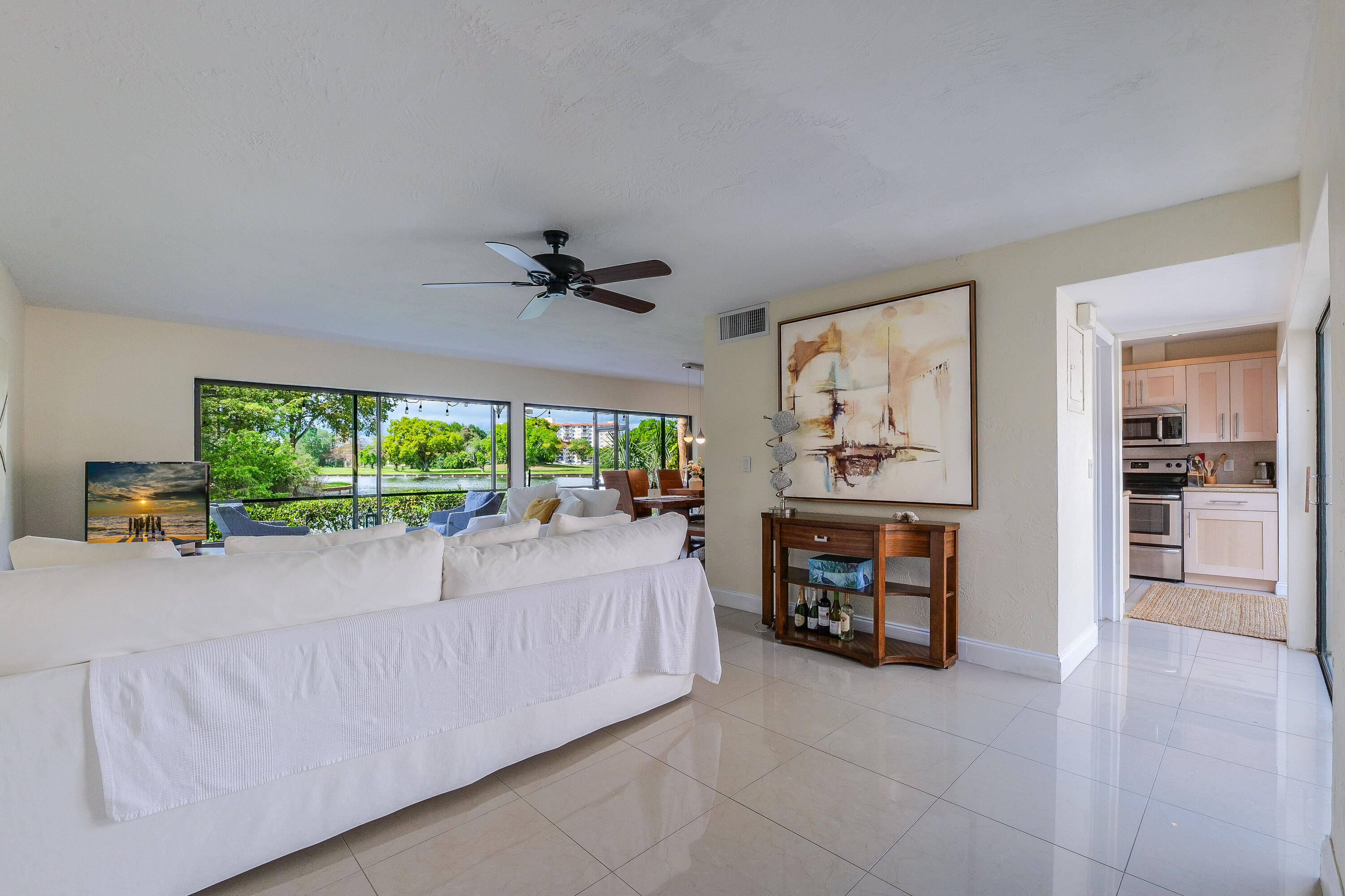 5523 Constant Spring Terrace, Unit 222 Lauderhill, FL 33319 - Photo 7 of 60 a living room with furniture and a fireplace