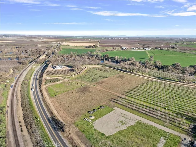 a view of a swimming pool with an outdoor seating