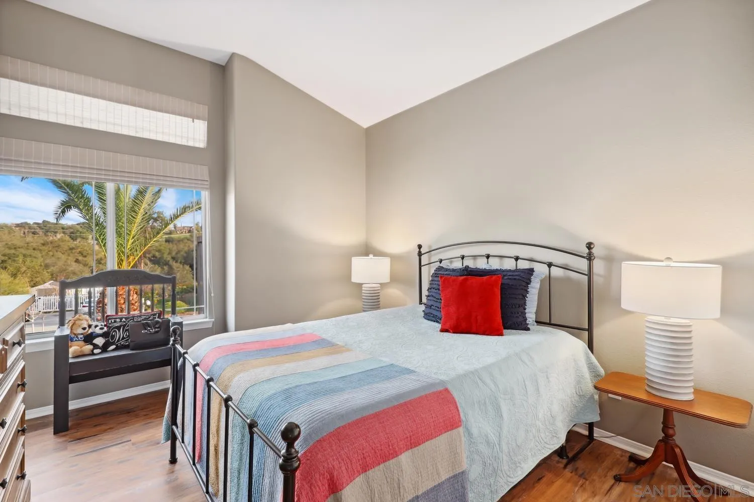 1783 Palomares Road Fallbrook, CA 92028 - Photo 19 of 40 a bedroom with a bed and a mirror