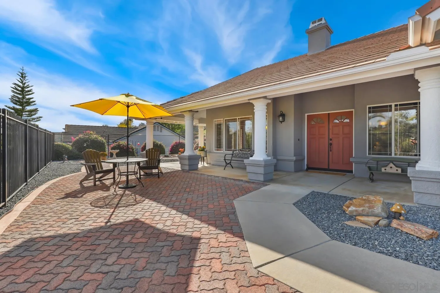 1783 Palomares Road Fallbrook, CA 92028 - Photo 2 of 40 a view of a patio with table and chairs with wooden floor and plants
