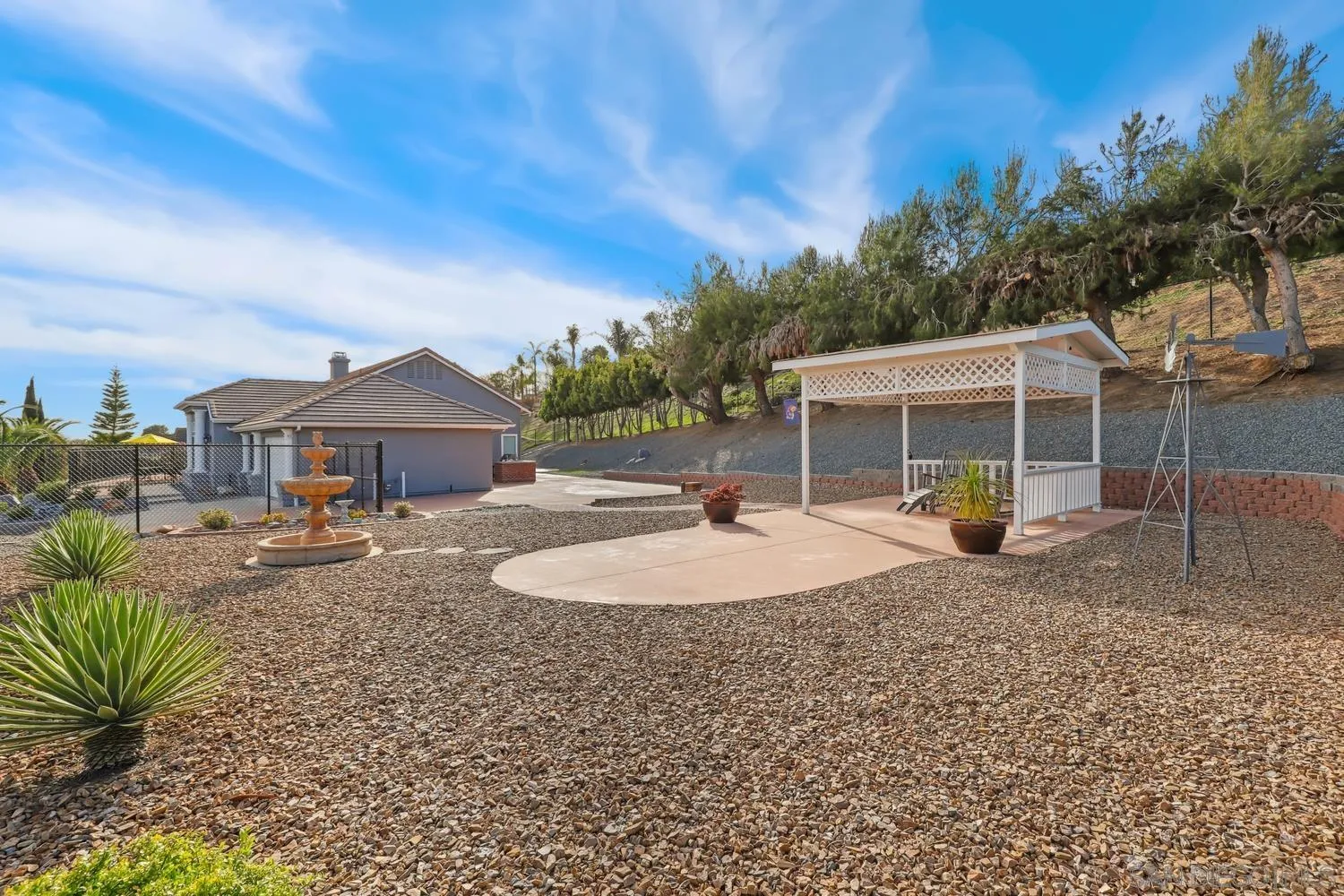 1783 Palomares Road Fallbrook, CA 92028 - Photo 30 of 40 a front view of a house with garden