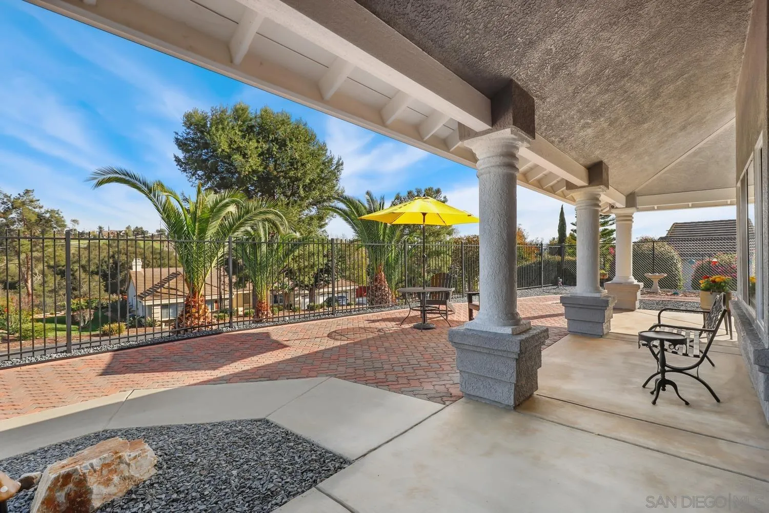 1783 Palomares Road Fallbrook, CA 92028 - Photo 3 of 40 a building outdoor space with patio furniture and potted plants