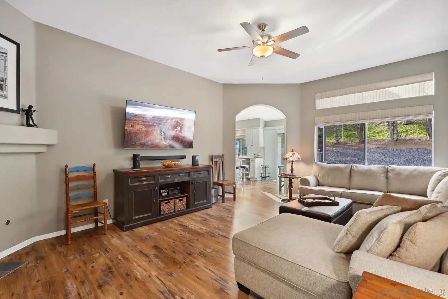 1783 Palomares Road Fallbrook, CA 92028 - Photo 5 of 40 a living room with furniture and a flat screen tv with wooden floor