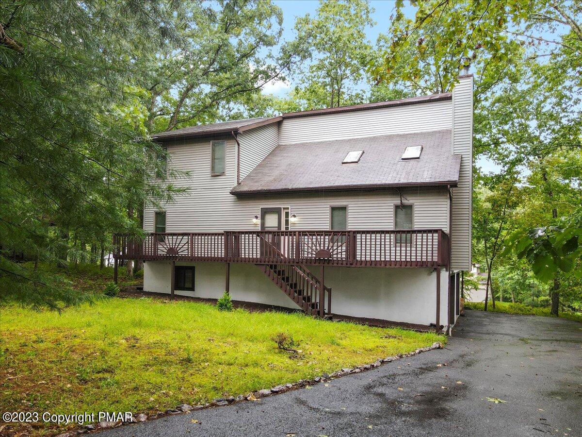 3237 Windemere Drive Bushkill, PA 18324 - Photo 1 of 50 a front view of a house with a yard