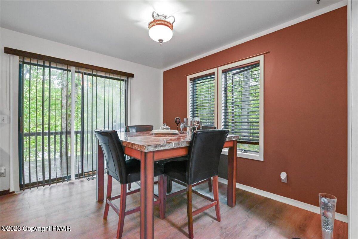 3237 Windemere Drive Bushkill, PA 18324 - Photo 11 of 50 a view of a dining room with furniture window and outside view