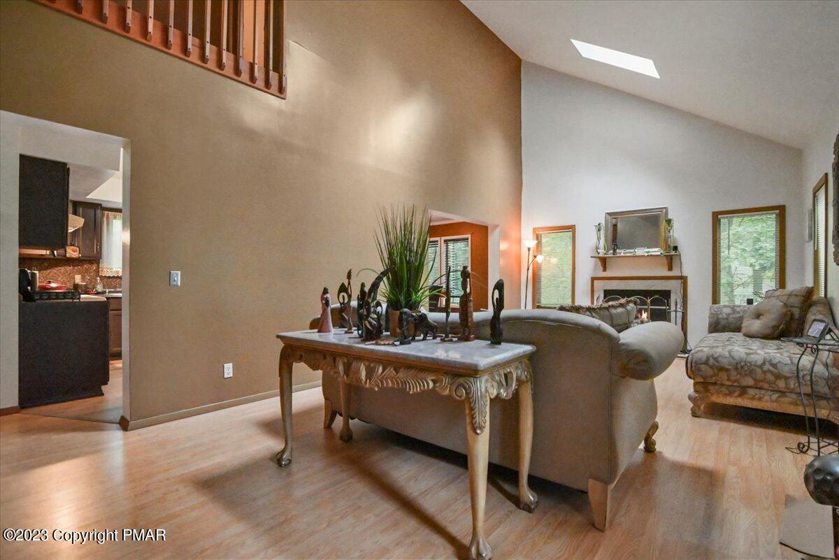 3237 Windemere Drive Bushkill, PA 18324 - Photo 15 of 50 a living room with furniture and a flat screen tv