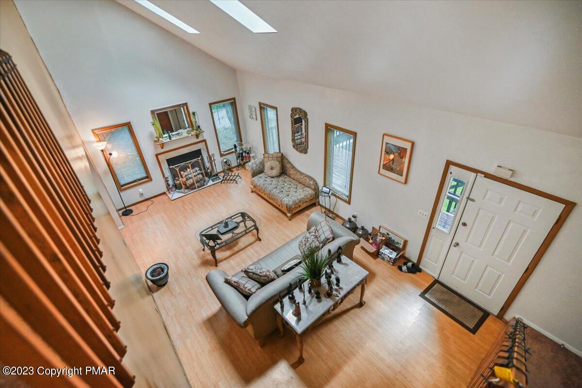 3237 Windemere Drive Bushkill, PA 18324 - Photo 17 of 50 a living room with furniture and a flat screen tv