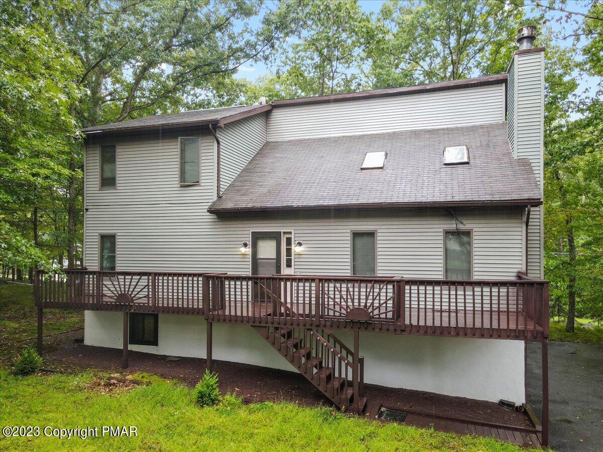 3237 Windemere Drive Bushkill, PA 18324 - Photo 3 of 50 a view of a house with a balcony