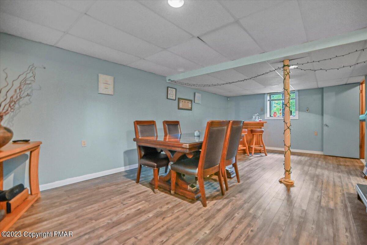 3237 Windemere Drive Bushkill, PA 18324 - Photo 31 of 50 a workspace with furniture wooden floor and a window