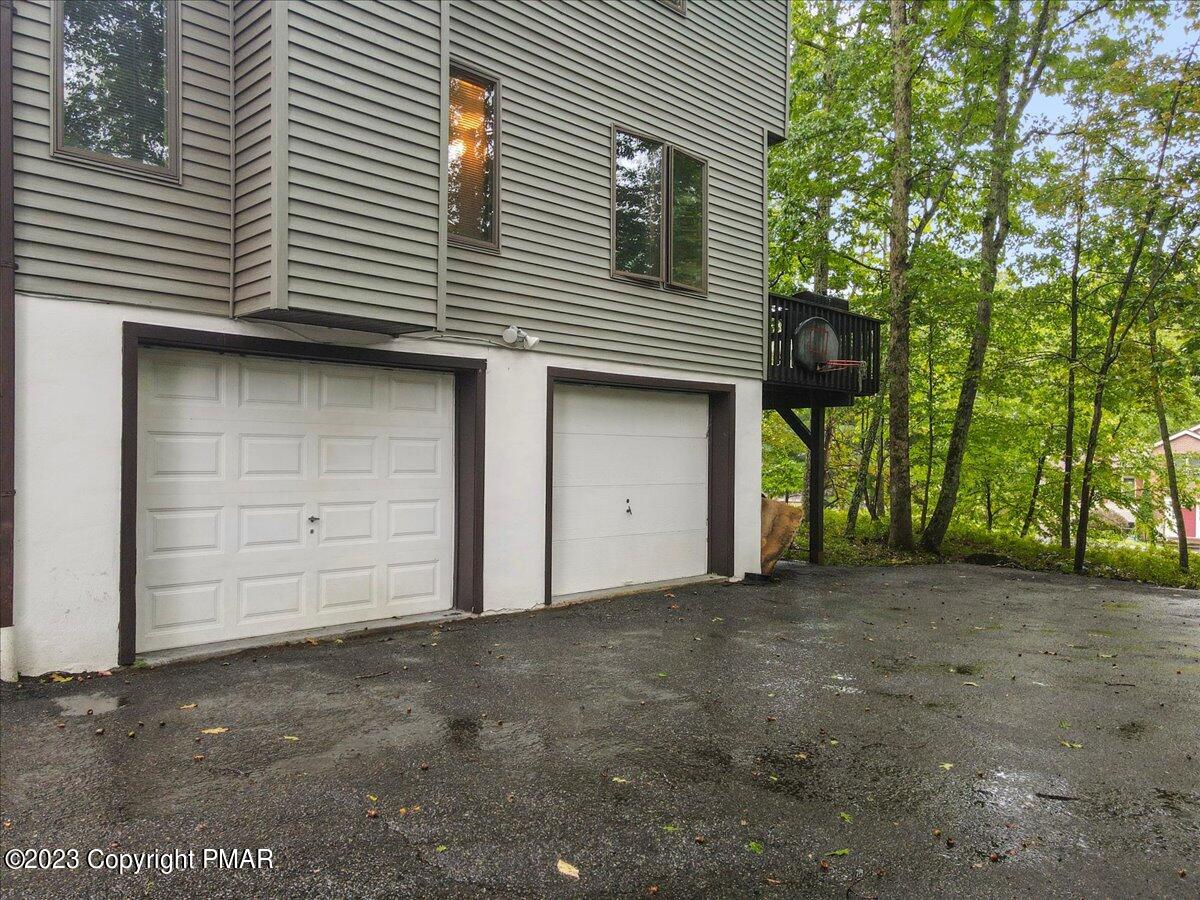3237 Windemere Drive Bushkill, PA 18324 - Photo 41 of 50 a view of a house with a garage