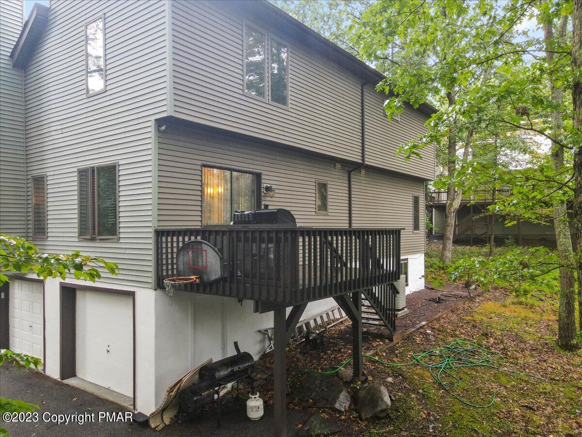 3237 Windemere Drive Bushkill, PA 18324 - Photo 42 of 50 a view of a house with backyard and sitting area