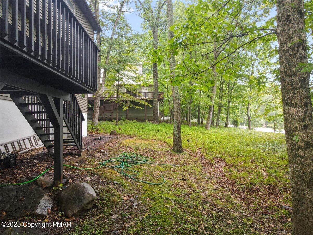 3237 Windemere Drive Bushkill, PA 18324 - Photo 46 of 50 a backyard of a house with lots of green space