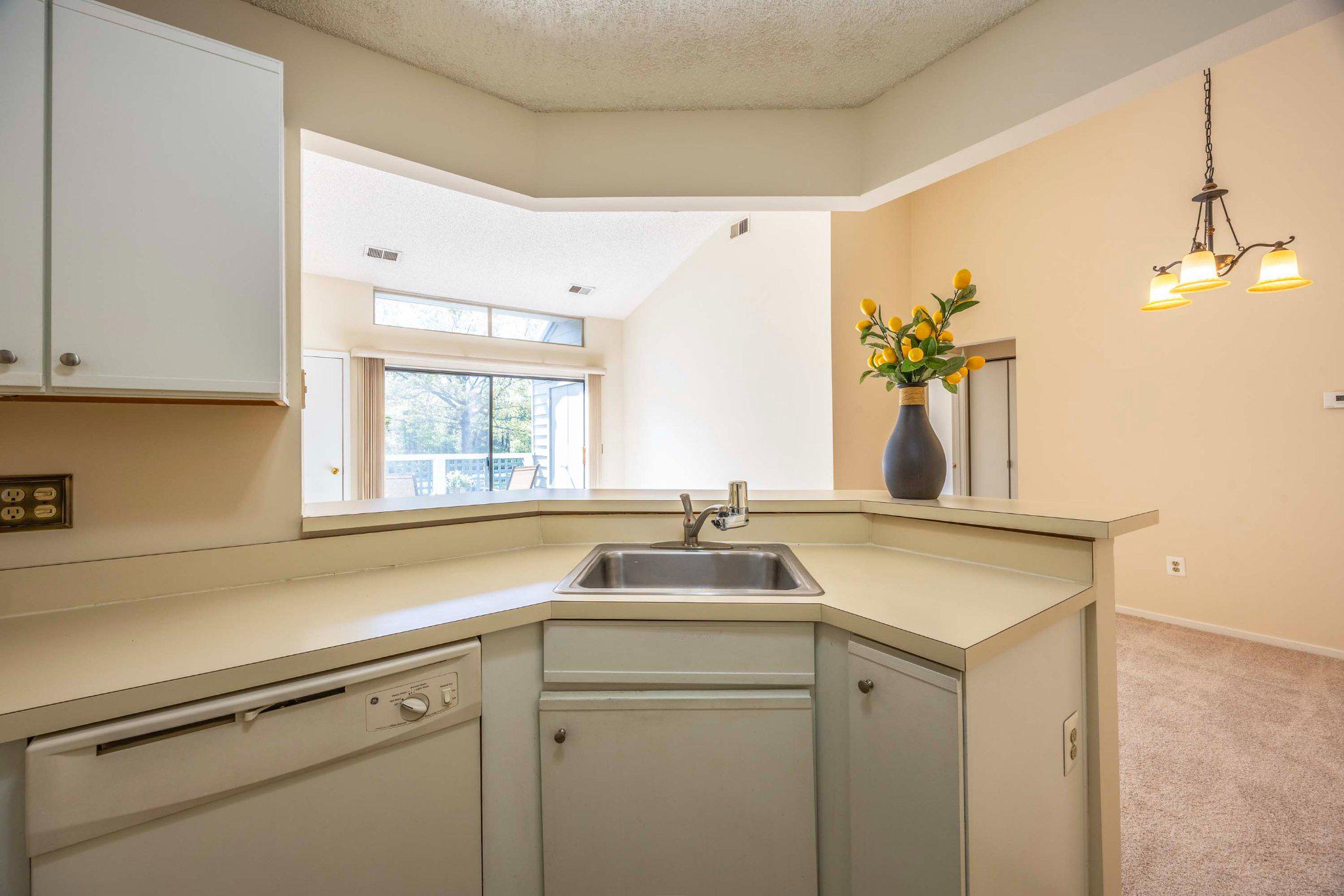 11703 Summerchase Circle, Unit B Reston, VA 20194 - Photo 13 of 22 Bright and inviting kitchen with outdoor view