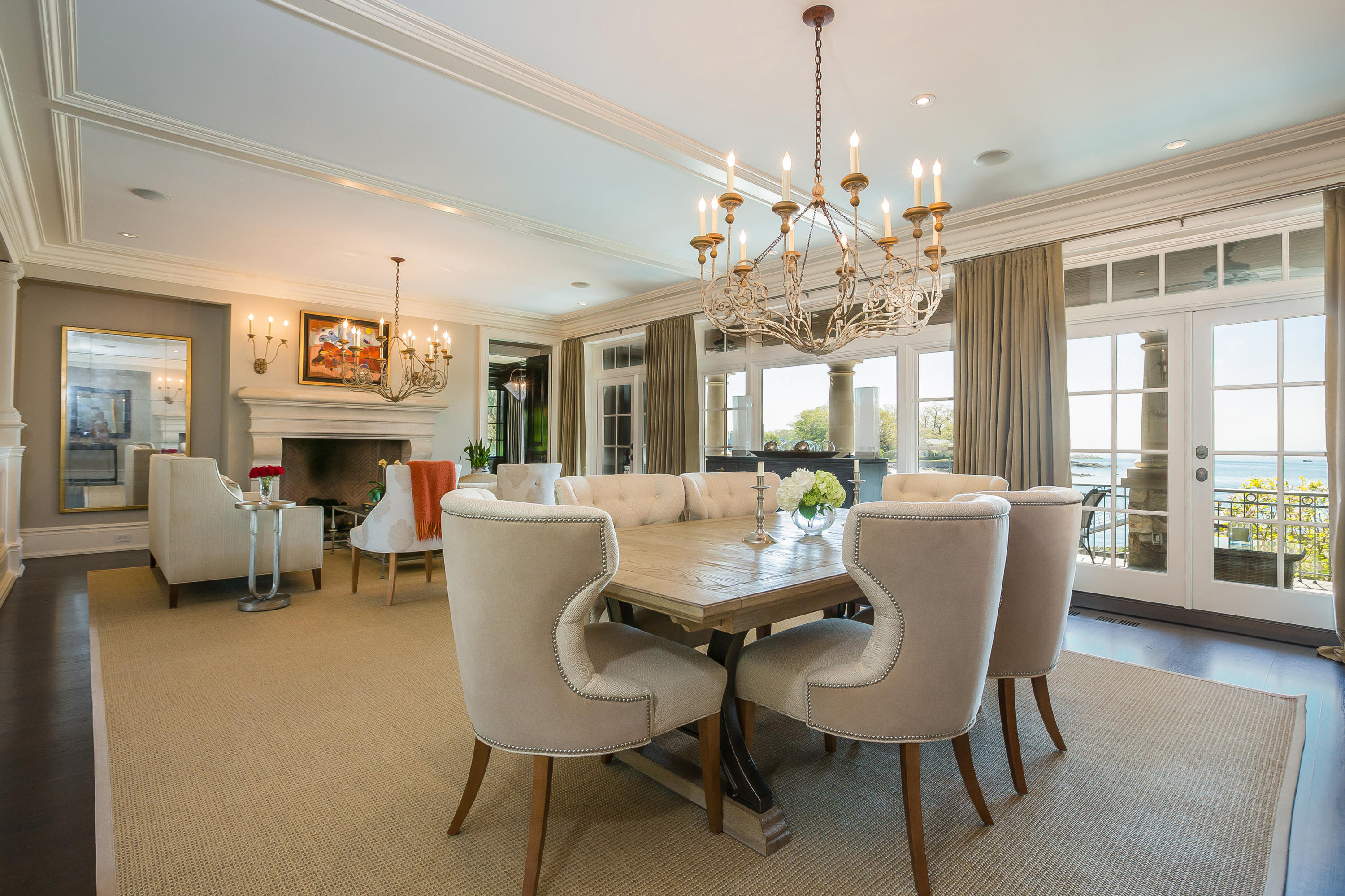 8 N Road Darien, CT 06820 - Photo 12 of 68 a dining room with furniture a chandelier and window